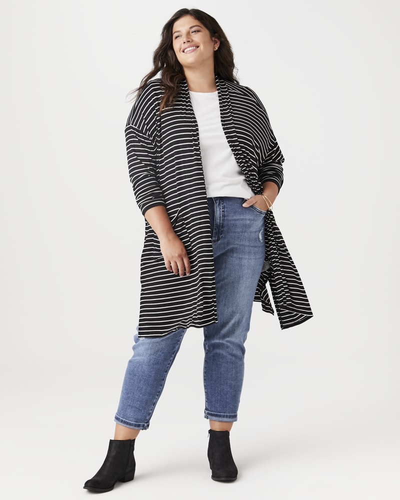 Plus size model with hourglass body shape wearing Cecelia Long Sleeve Cardigan by Peace and Pearls | Dia&Co | dia_product_style_image_id:141402
